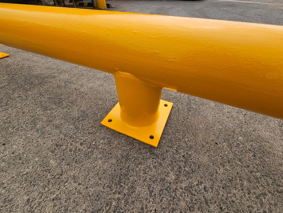 Heavy-duty yellow loading bay wheel guides – product view
